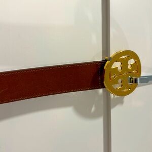 Tory Burch gold/cognac logo belt.  Size medium.